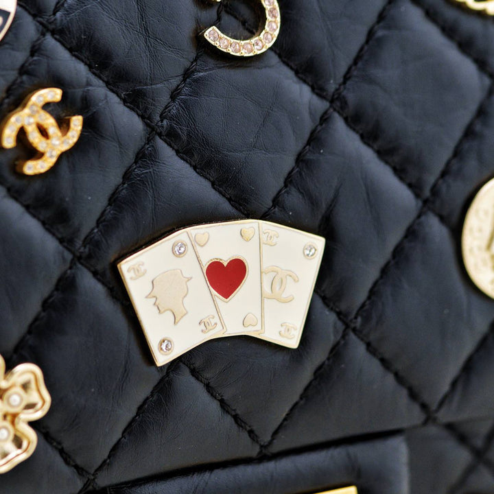 Preowned Authentic Chanel Limited Edition 2.55 Reissue 225 Lucky Charms Double Flap Black Leather Bag Full set 