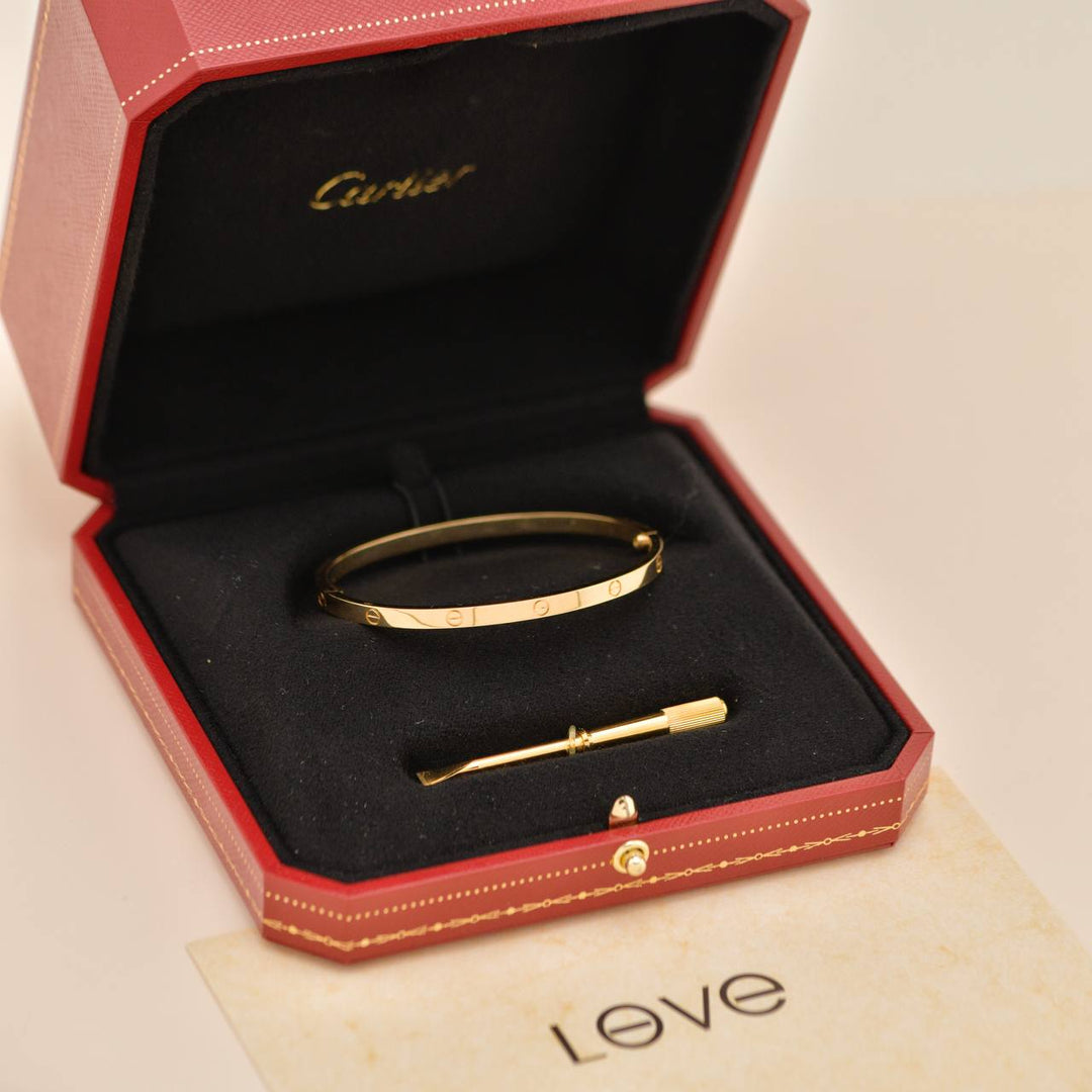 Preowned Authentic Full set Cartier Love Small Model Bracelet Size 17 18K Yellow Gold