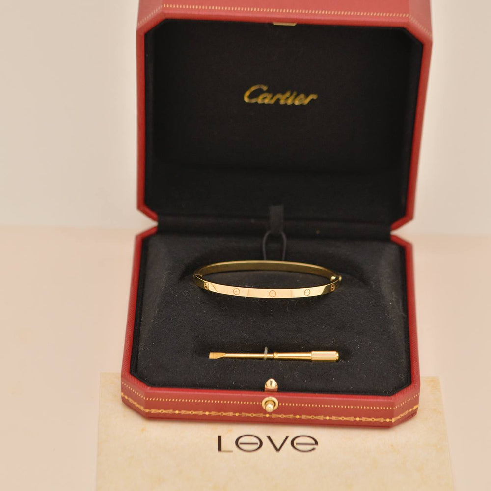 Preowned Authentic Full set Cartier Love Small Model Bracelet Size 17 18K Yellow Gold