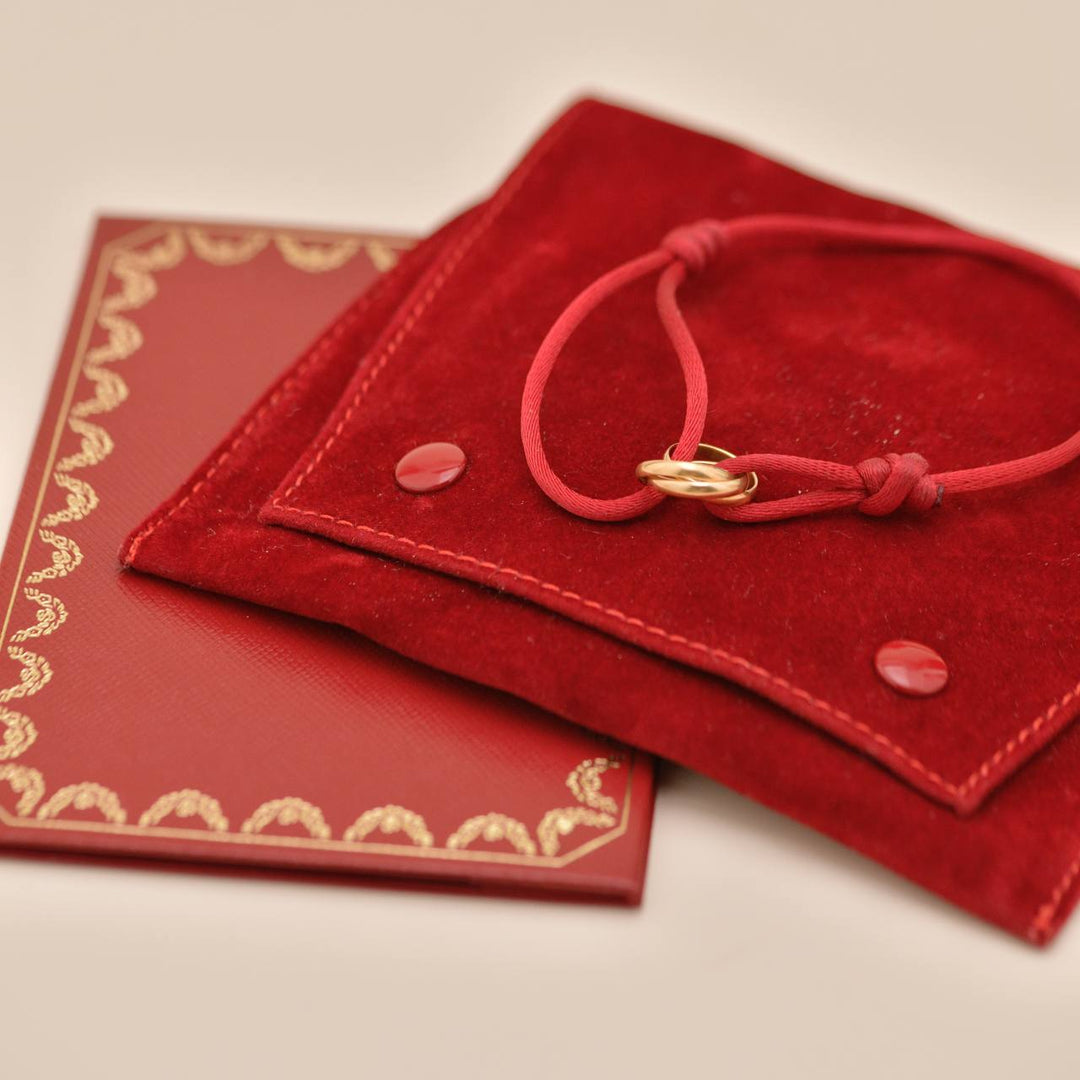 Second Hand Cartier Trinity 18K Rose Gold Red Silk Cord Bracelet