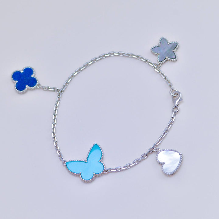 Authentic Second Hand Full set Van Cleef & Arpels Lucky Alhambra Bracelet Turquoise Lapis Lazuli & Mother of Pearl 18K White Gold