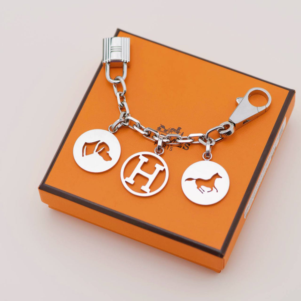 Preowned Authentic Hermès Breloque Olga Silver Bag Charm Amulette