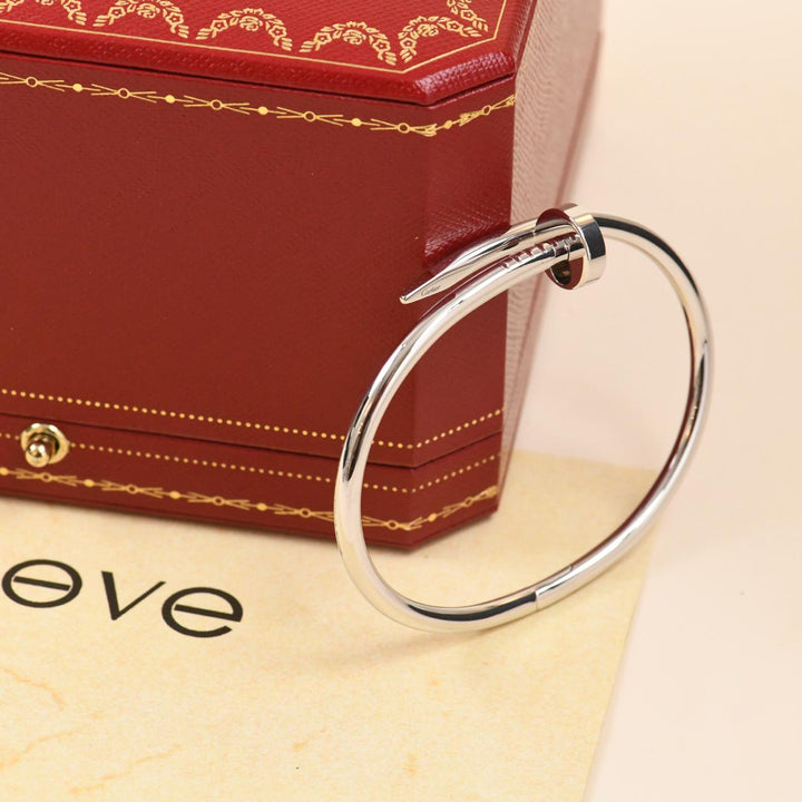 Preowned authentic Cartier Juste un Clou bracelet in 18K white gold, classic model size 17