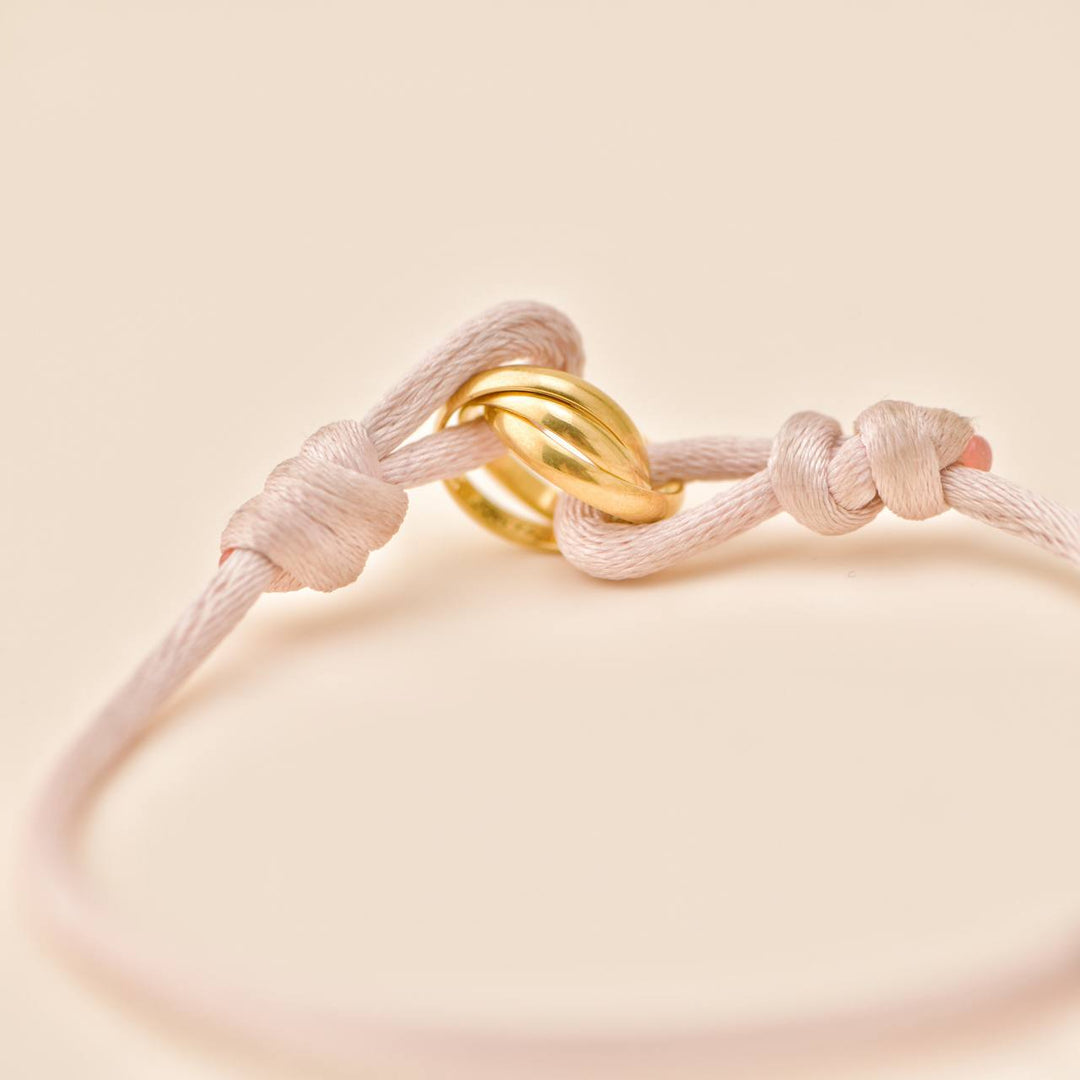 Preloved Authentic Cartier Trinity 18K Yellow Gold Cord Bracelet