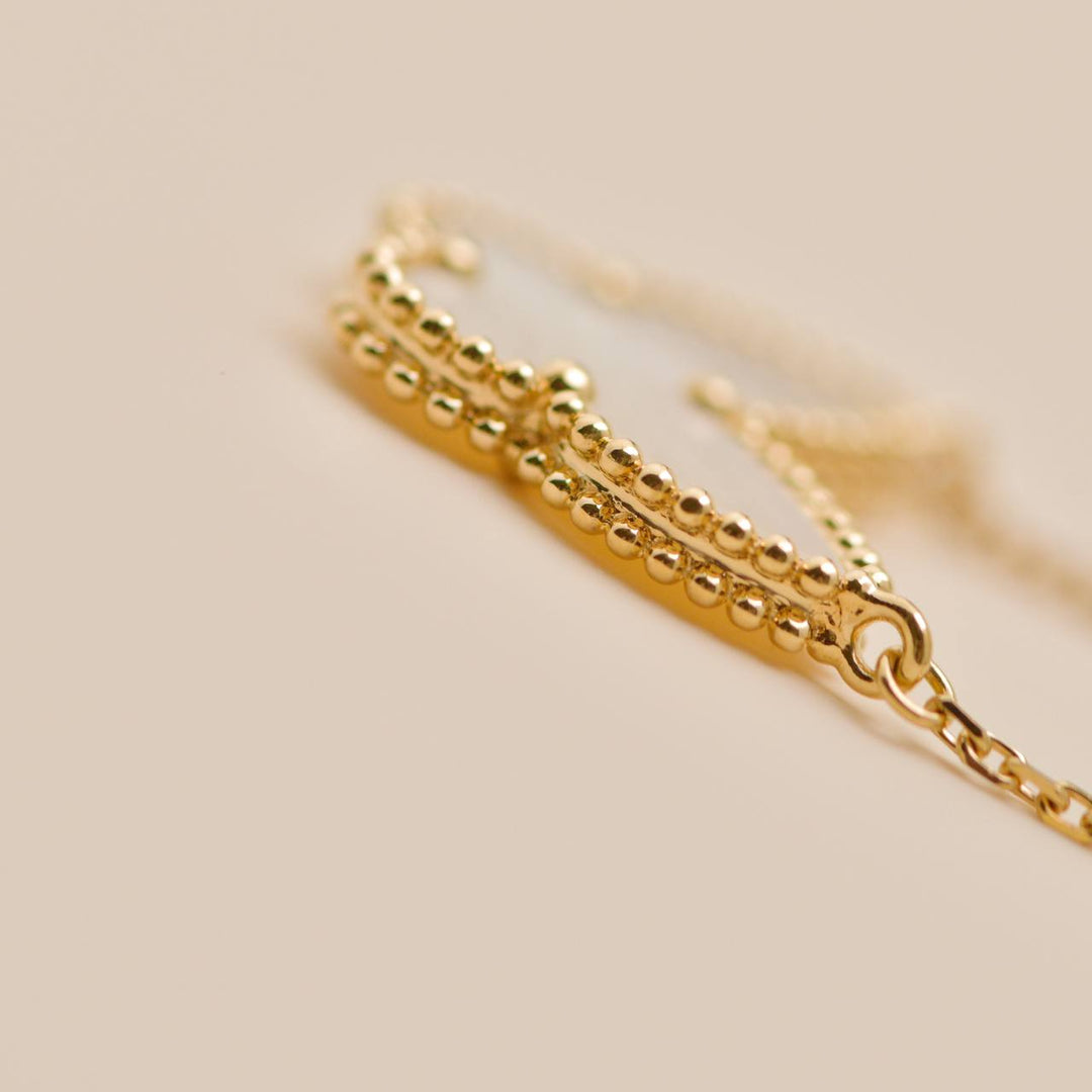 Preowned Authentic Van Cleef Lucky Alhambra Butterfly Necklace Mother of Pearl 18K Yellow Gold