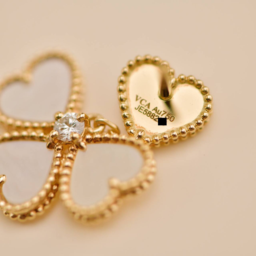 Van Cleef & Arpels Sweet Hearts Mother of Pearl Diamond Earrings 18K Yellow Gold