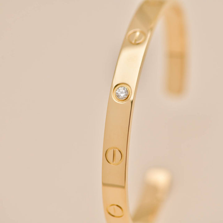 Preowned Authentic Cartier Love Cuff Bracelet One Diamond 18K Yellow Gold Size 18
