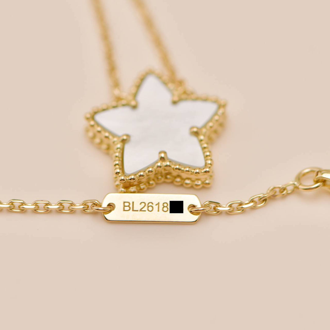 Second Hand Authentic Van Cleef Alhambra 2008 Holiday Necklace Mother of Pearl 18K Yellow Gold