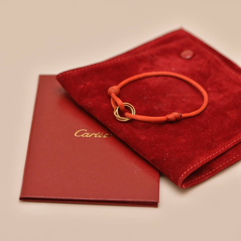 Preowned Authentic Full Set Cartier Trinity Red Silk Cord Bracelet 18K Rose Gold