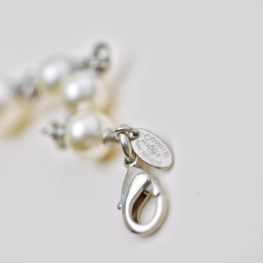 Authentic Used Chanel CC Faux Pearl Sautoir Necklace with Five Logos