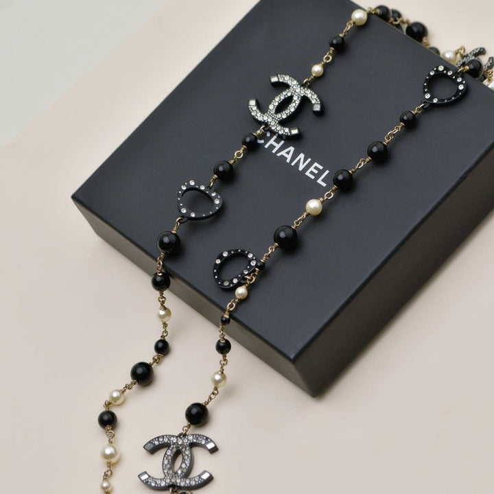 Preowned Authentic Chanel CC Faux Pearl & Crystal Black Bead Sautoir Necklace