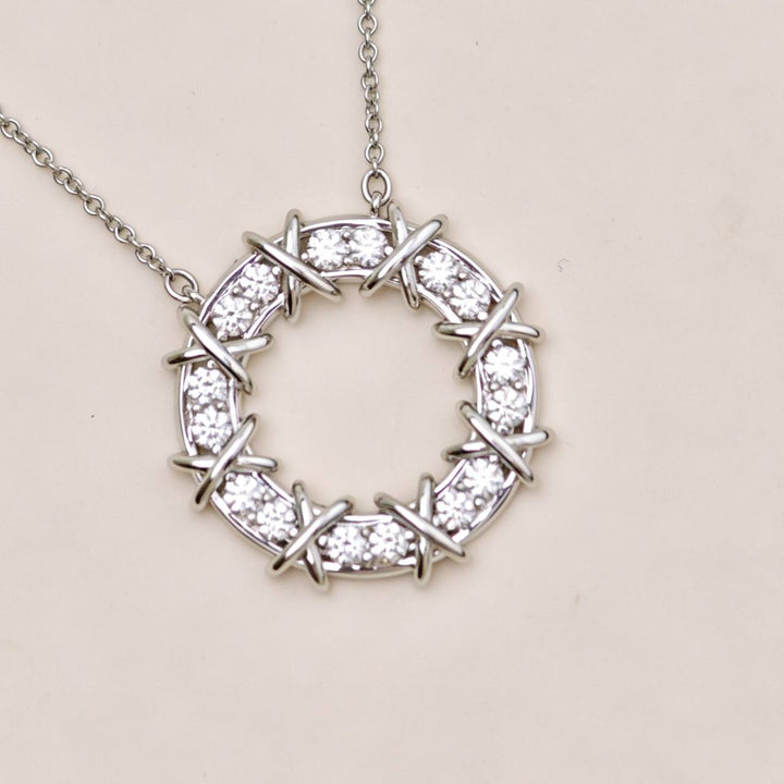 Authentic Preowned Tiffany & Co. Platinum Diamond Sixteen Stone Circle Pendant Necklace
