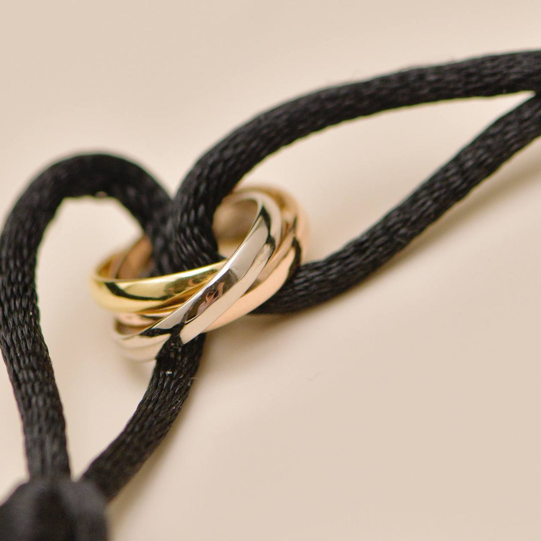 Preloved Cartier Trinity 18K White, Rose and Yellow Gold Black Cord Bracelet