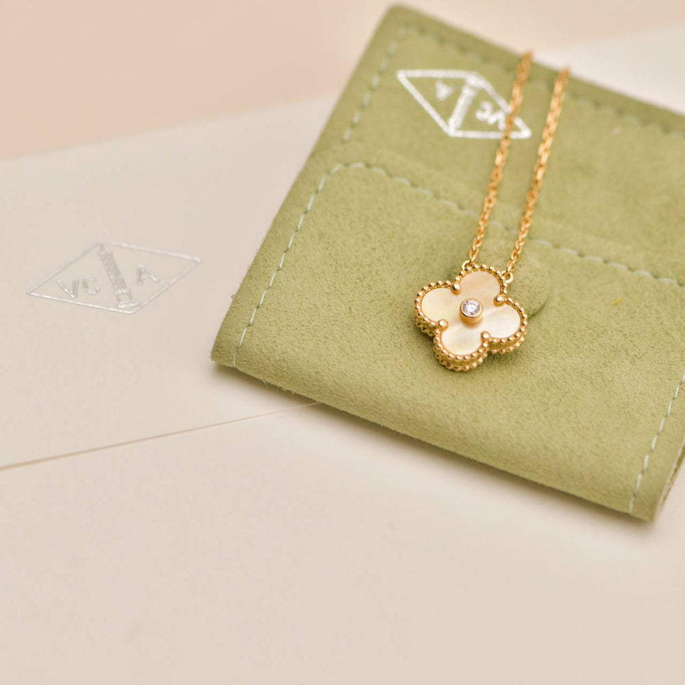 Preowned Authentic Van Cleef & Arpels 2018 Holiday Pendant Golden Mother of Pearl Diamond 18K Yellow Gold