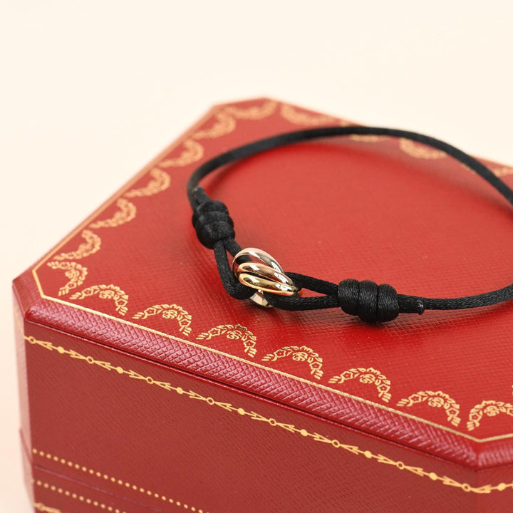 Cartier Trinity 18K Three Tone Gold Cord Bracelet