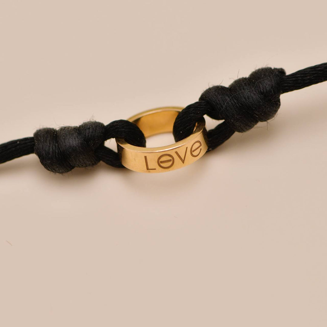 Authentic Preowned Cartier Love Cord bracelet in 18K rose gold with black adjustable cord