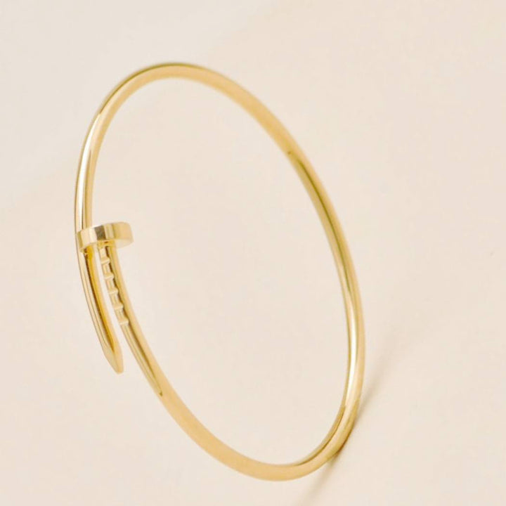 Preowned Authentic Cartier Juste un Clou small model bracelet 18K yellow gold size 18