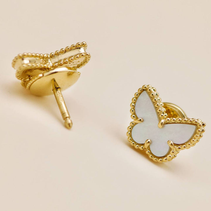 Preowned Authentic Van Cleef Sweet Alhambra Butterfly Mother of Pearl Earstuds