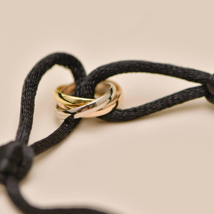 Used Authentic Cartier Trinity 18K White, Rose and Yellow Gold Black Cord Bracelet