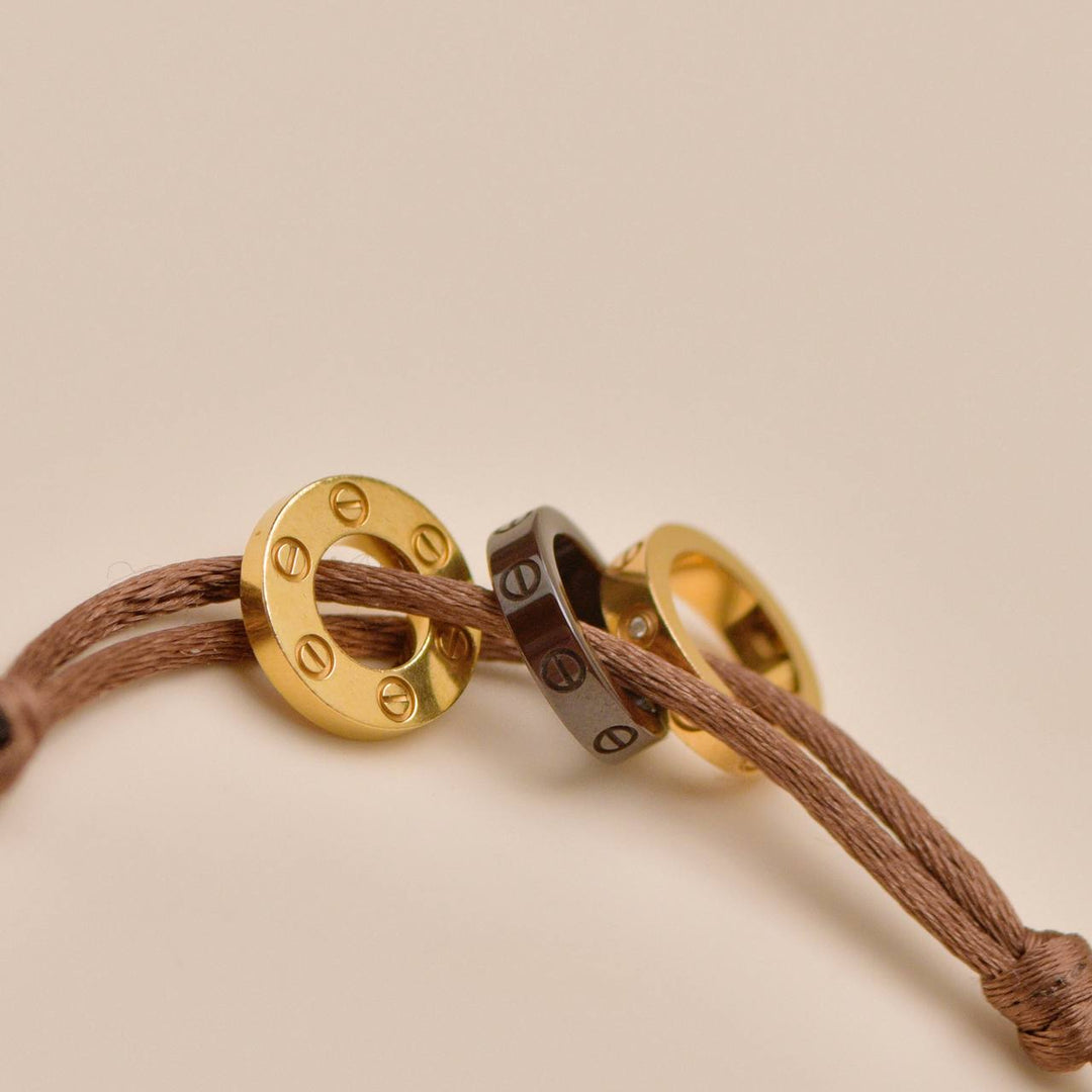 Second hand Authentic Full set Cartier Love Cord Bracelet 4 Diamonds Sèvres Porcelain in 18K Yellow & Rose Gold