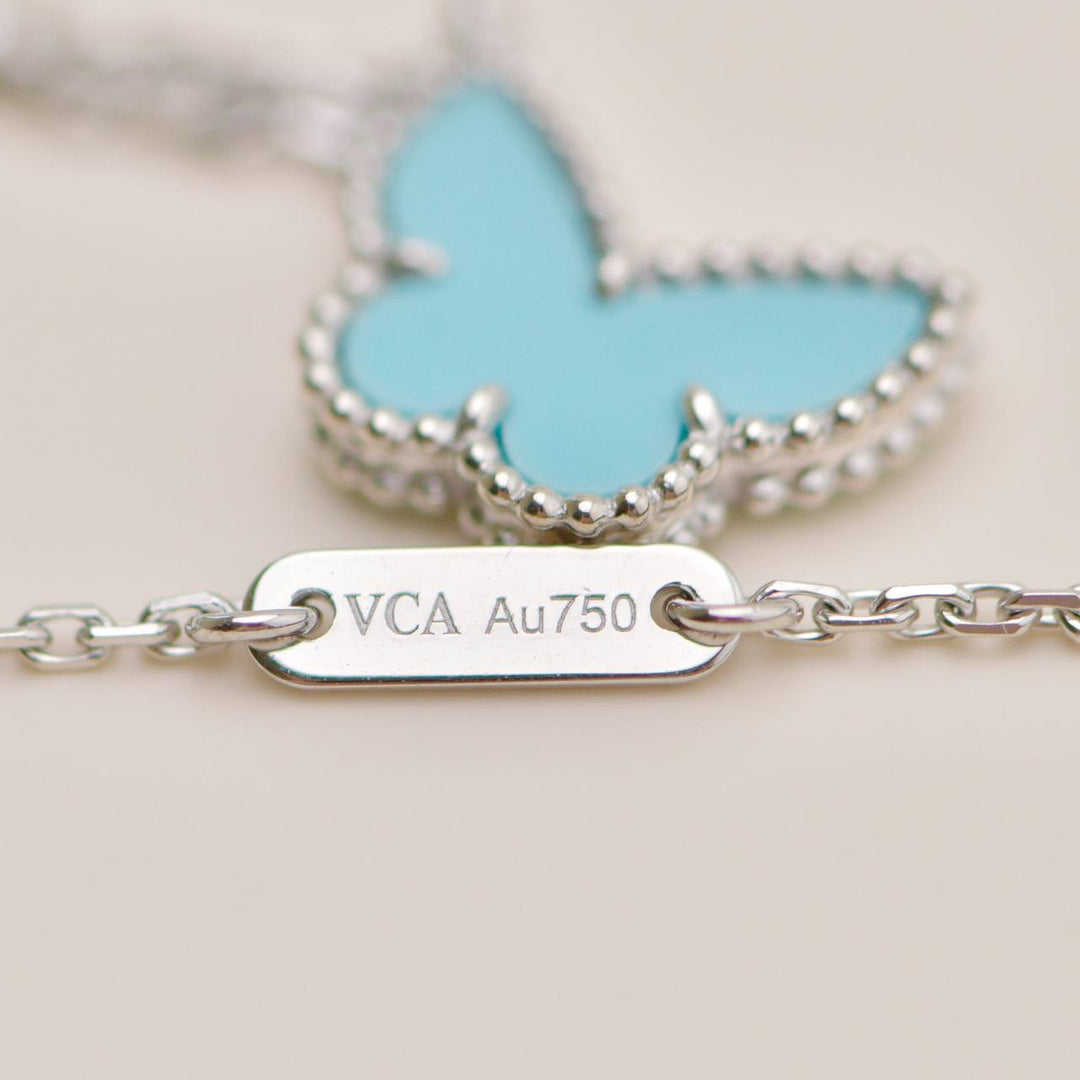 Second Hand Authentic Van Cleef & Arpels Sweet Alhambra Turquoise Butterfly 18K White Gold Necklace