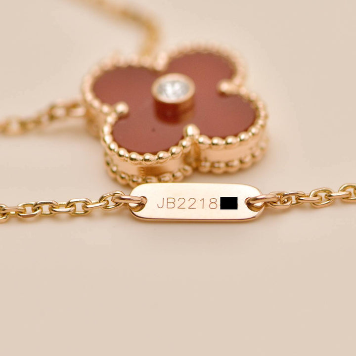 Preowned Authentic Van Cleef 2011 Holiday Pendant Carnelian Diamond 18K Rose Gold
