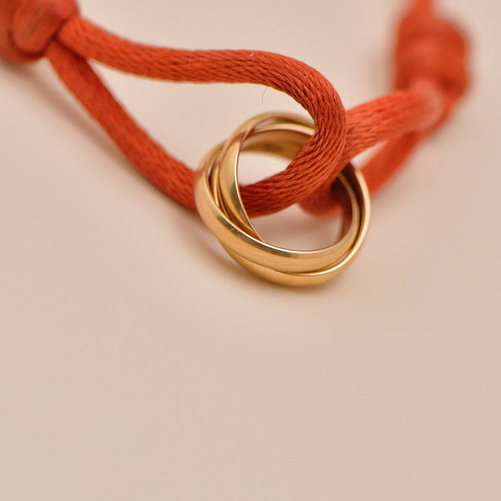 Second Hand Cartier Trinity Red Silk Cord Bracelet 18K Rose Gold