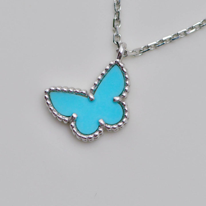 Preowned Van Cleef Sweet Alhambra Turquoise Butterfly Necklace 18K White Gold