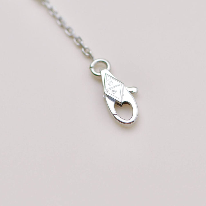 Second Hand Authentic Van Cleef Sweet Alhambra Turquoise Butterfly 18K White Gold Necklace