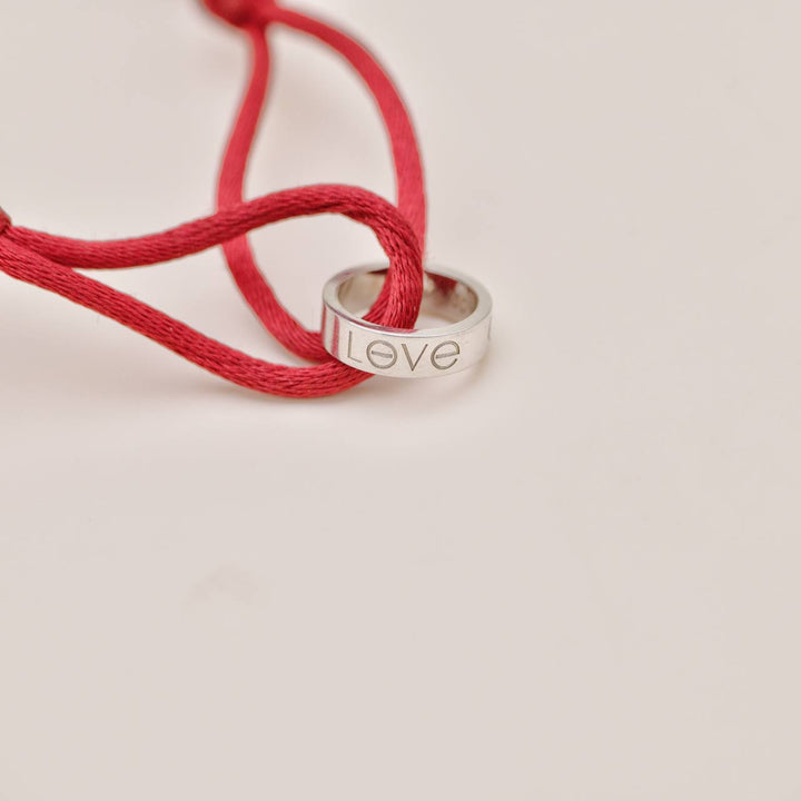 Preowned Cartier Love Cord Bracelet 18K White Gold Red Silk