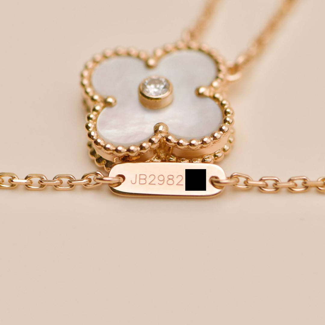 Van Cleef & Arpels Alhambra 2012 Holiday Necklace Diamond Mother of Pearl