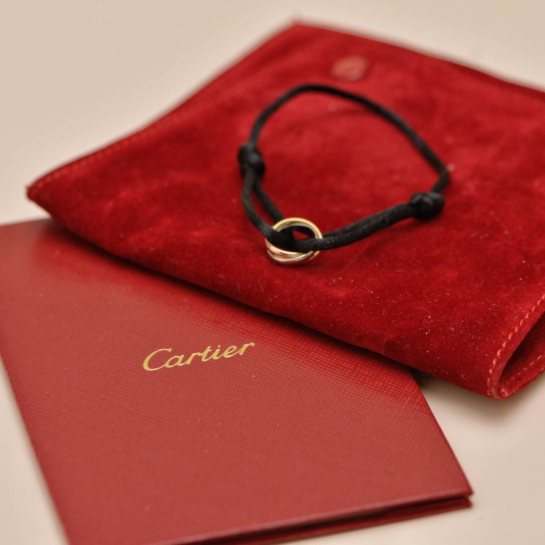 Preowned Authentic Cartier Trinity 18K White, Rose and Yellow Gold Black Cord Bracelet