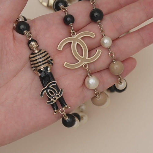 Preowned Authentic Chanel CC Limited Edition Enamel Mademoiselle Faux Pearl Long Necklace