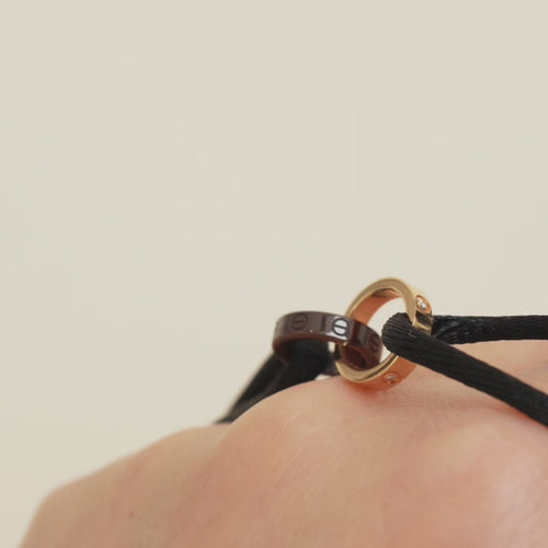 Preowned Cartier Love 4 Diamond 18K Rose Gold Sevres Porcelain Black Silk Cord Bracelet