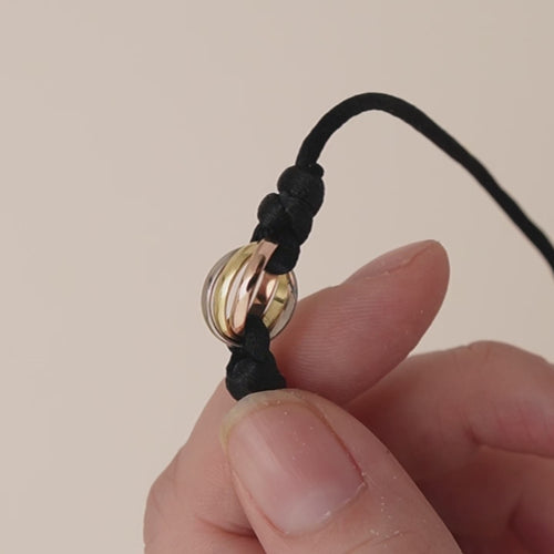 Preloved Authentic Cartier Trinity 18K White, Rose and Yellow Gold Black Cord Bracelet