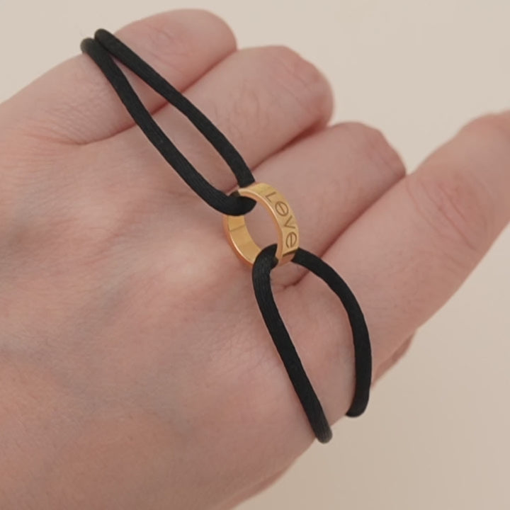 Authentic Preowned full set Cartier Love Cord bracelet in 18K rose gold with black adjustable cord