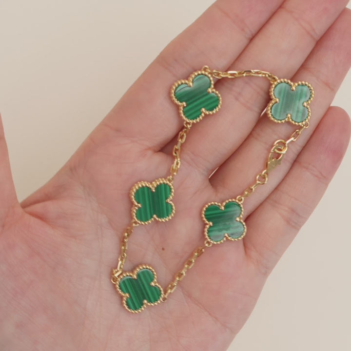 Van Cleef & Arpels 5 Motif Vintage Alhambra Malachite Yellow Gold Bracelet modelling photo