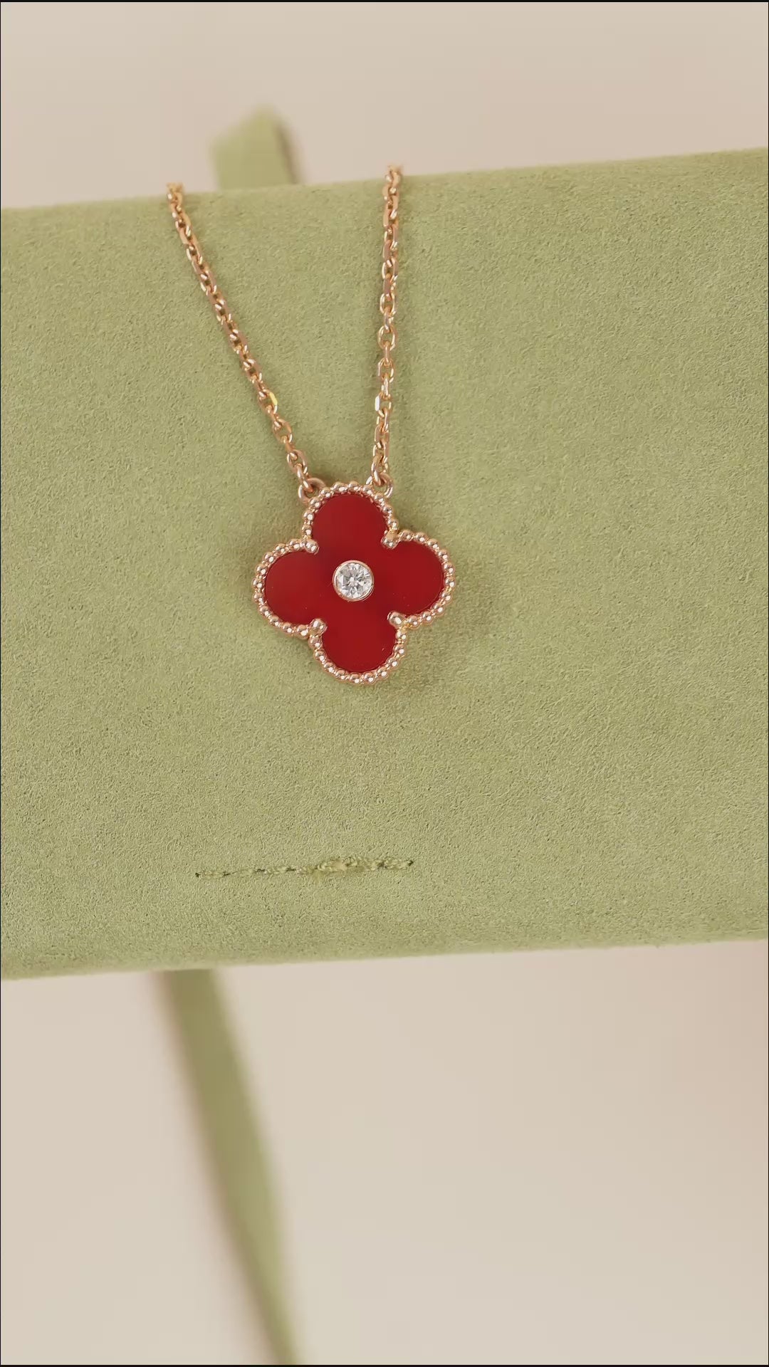 van cleef red Canadian holiday pendant