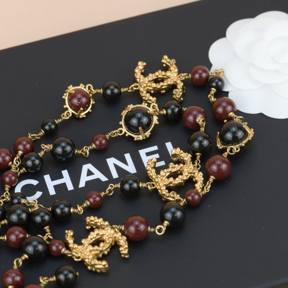 Chanel CC Long Strand Burgundy and Black Necklace