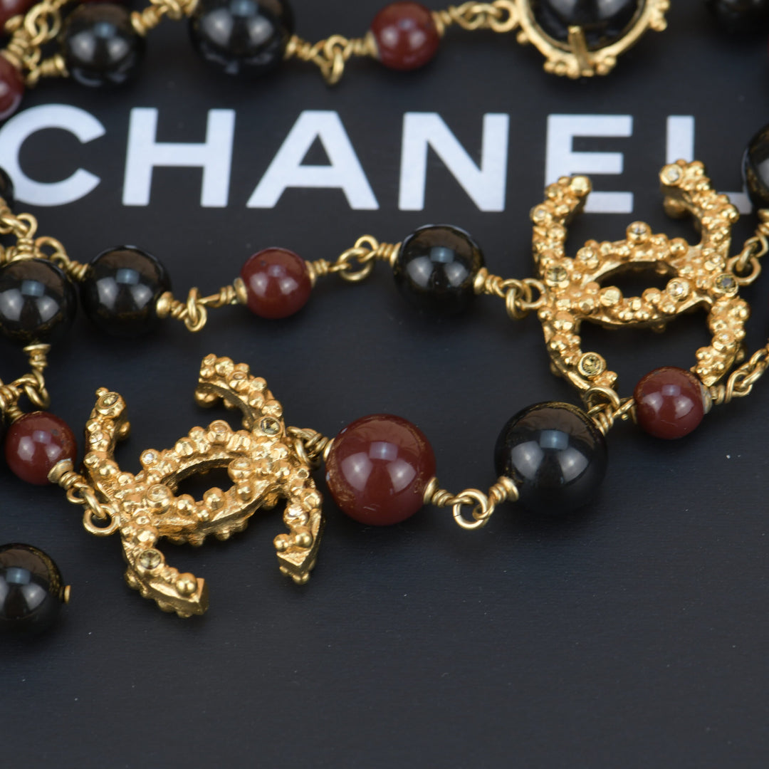 Chanel CC Long Strand Burgundy and Black Necklace