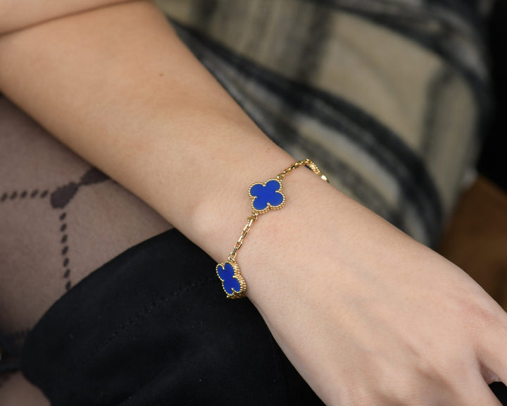 Van Cleef & Arpels Blue Agate Vintage Alhambra 18k Gold Bracelet modelling photo