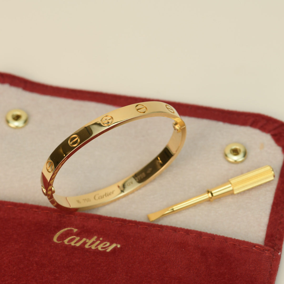 Cartier Love 18K Yellow Gold Bracelet pouch photo