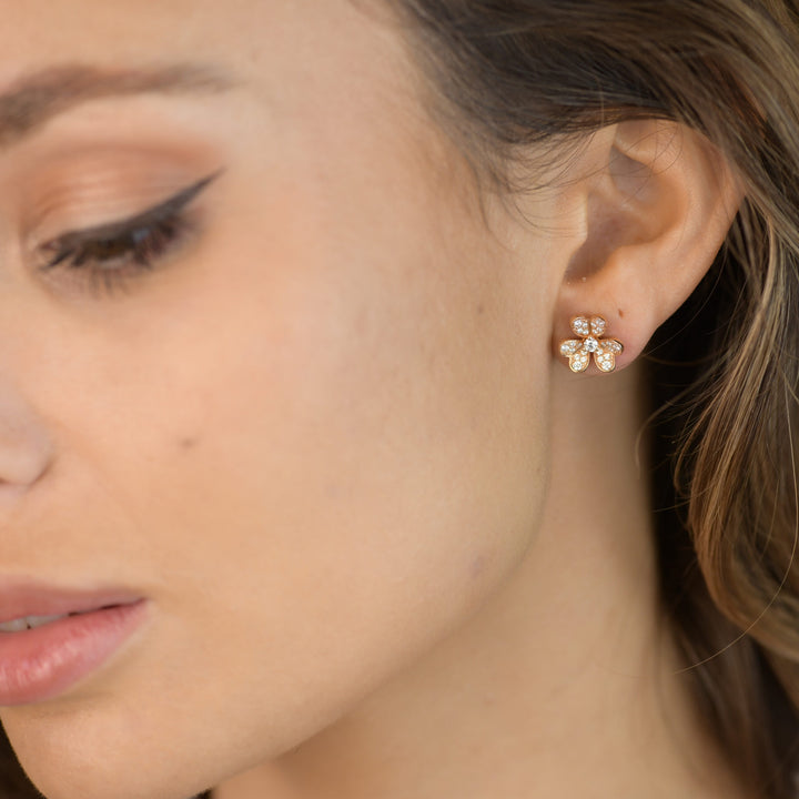 Van Cleef & Arpels Frivole Flower Rose Gold Diamond Earrings modelling photo