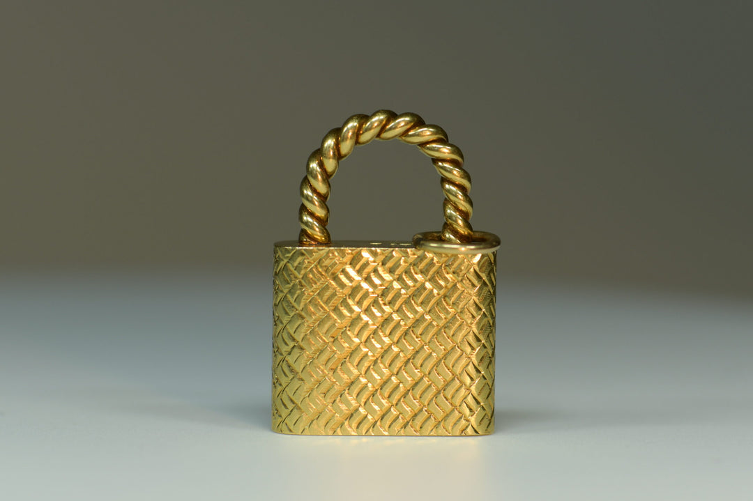 18 Karat Gold Padlock Pendant by Cartier - SOLD