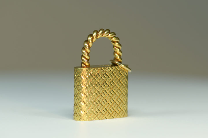 18 Karat Gold Padlock Pendant by Cartier - SOLD