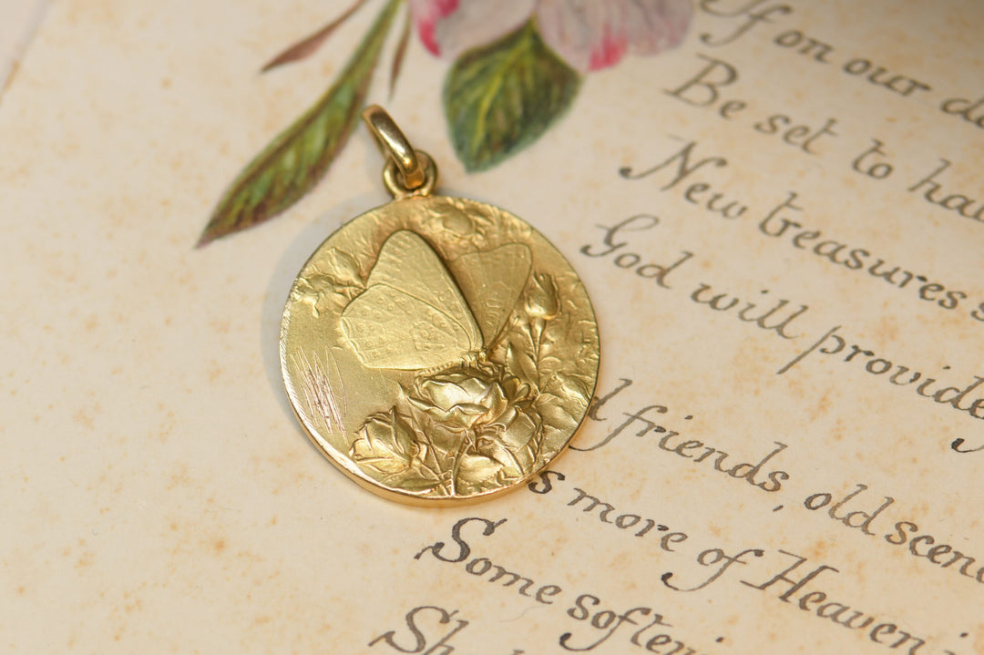 A French Art Nouveau Gold Medallion Pendant