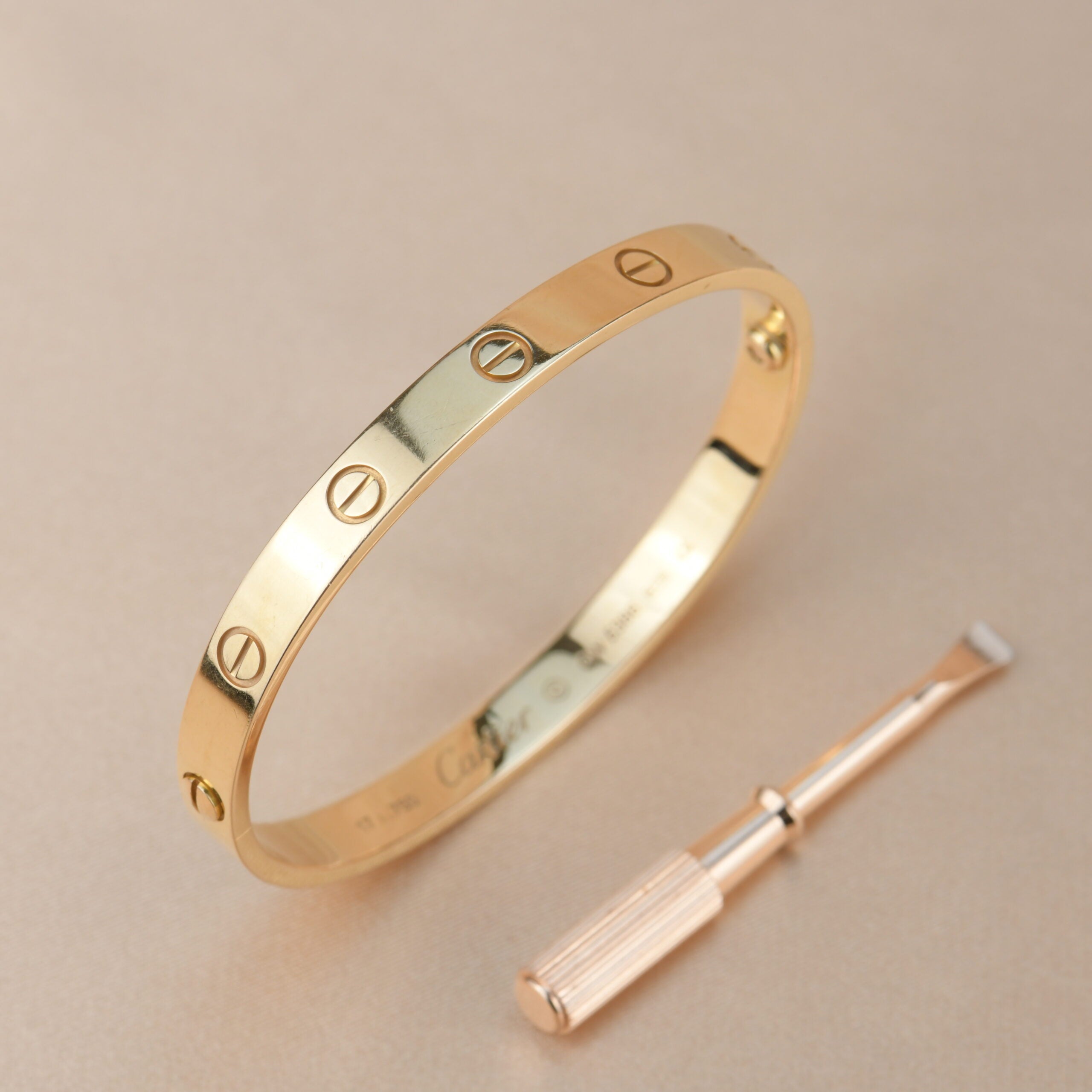 Cartier love bracelet hot sale gold replica