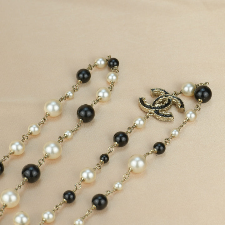 Chanel CC Logo Black Enamel Long Pearl Necklace In Gilt Gold