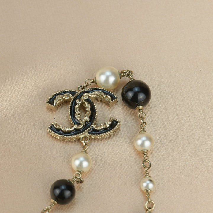 Chanel CC Logo Black Enamel Long Pearl Necklace In Gilt Gold