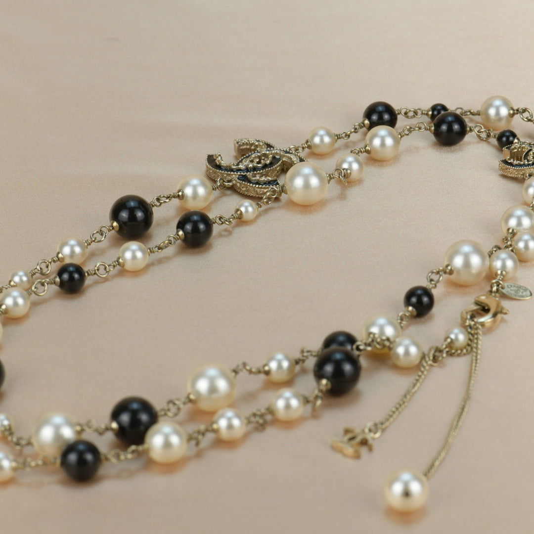 Chanel CC Logo Black Enamel Long Pearl Necklace In Gilt Gold